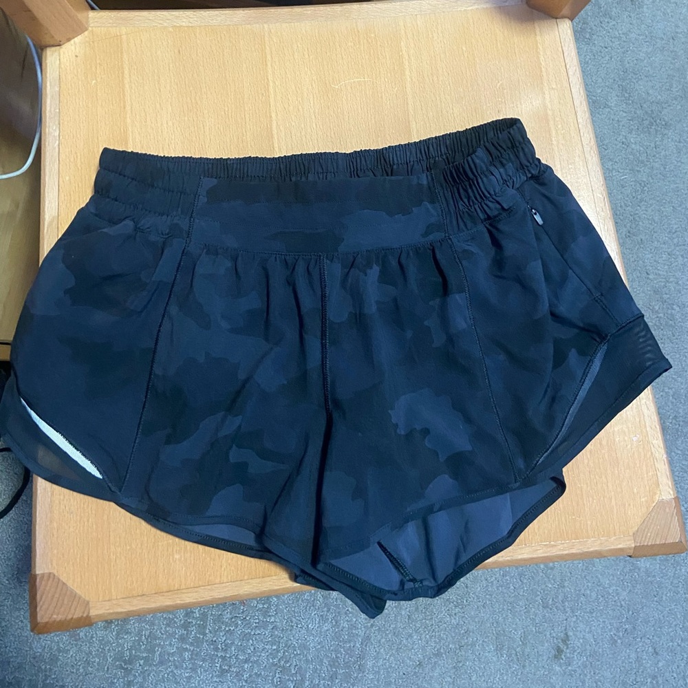 Black/gray camo lululemon shorts, style is “hottie hot”, size 8 reg